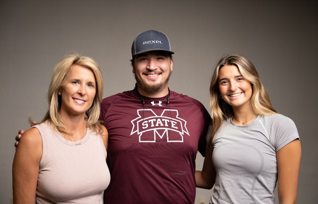 A mountain next to a lake