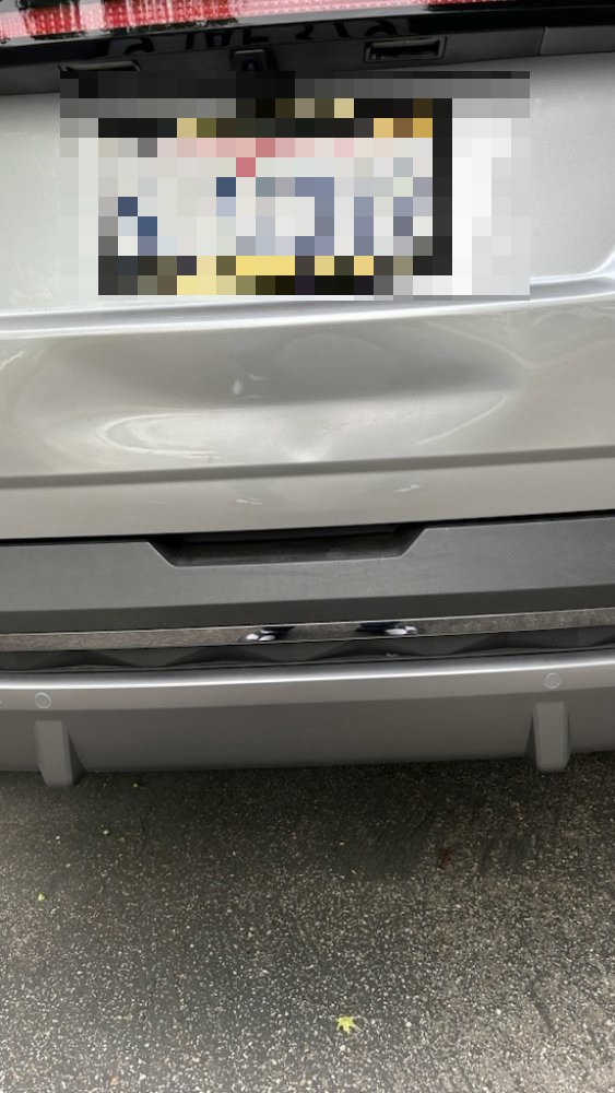 Hyundai Tucson tailgate dent