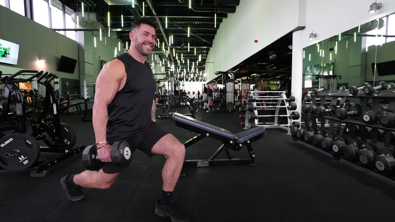 Fitness workout demonstration by Danny Clifford in a gym, filmed as part of a professional fitness video production for YouTube content.