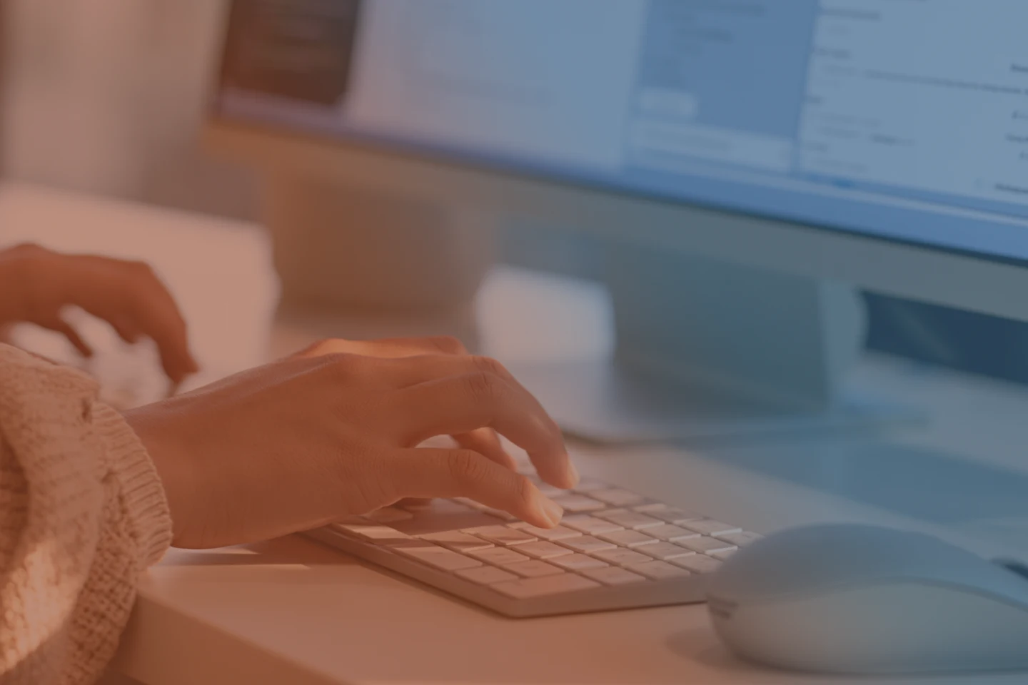 woman typing on computer