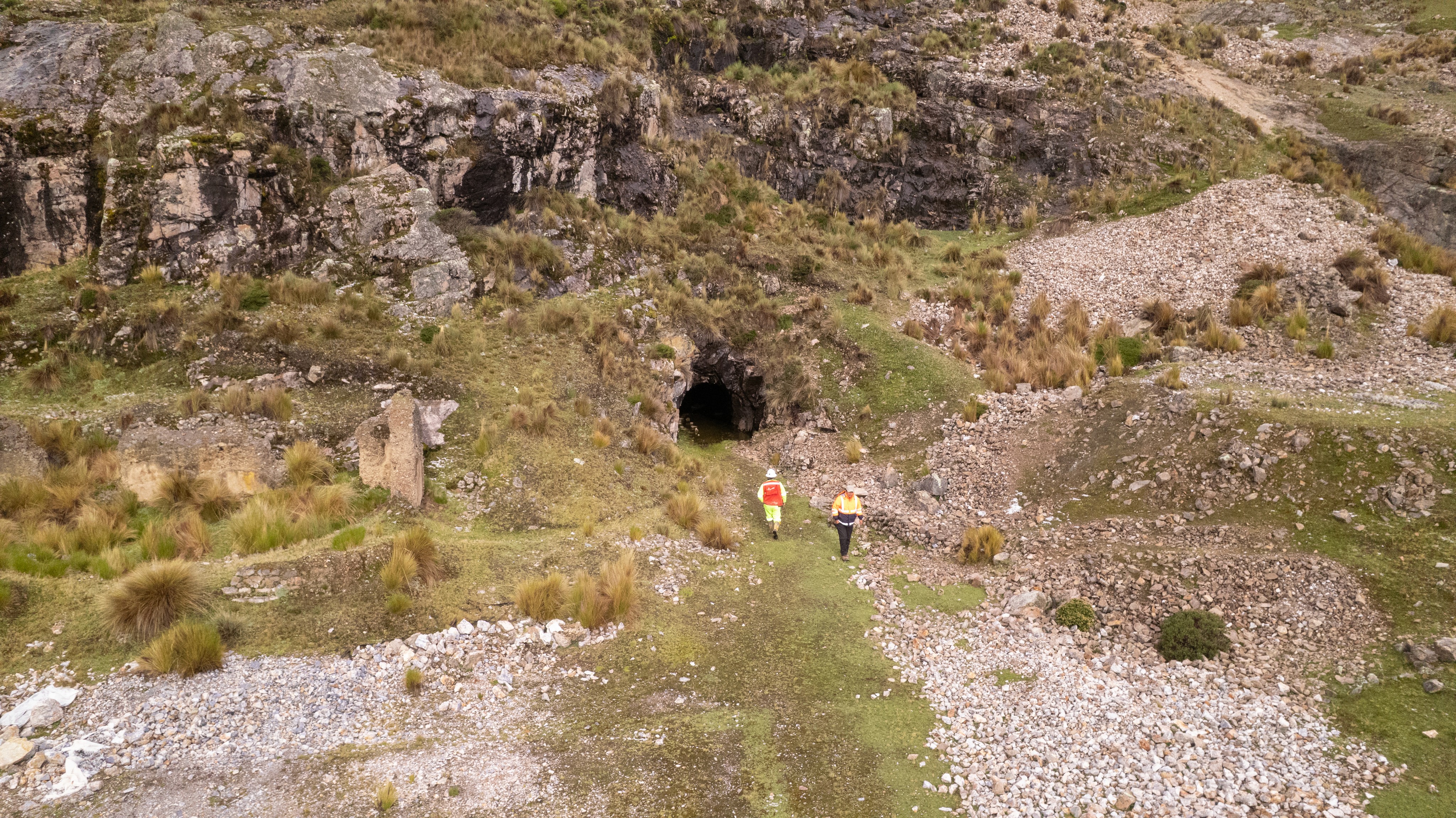a body of water with lily pads floating on top of it