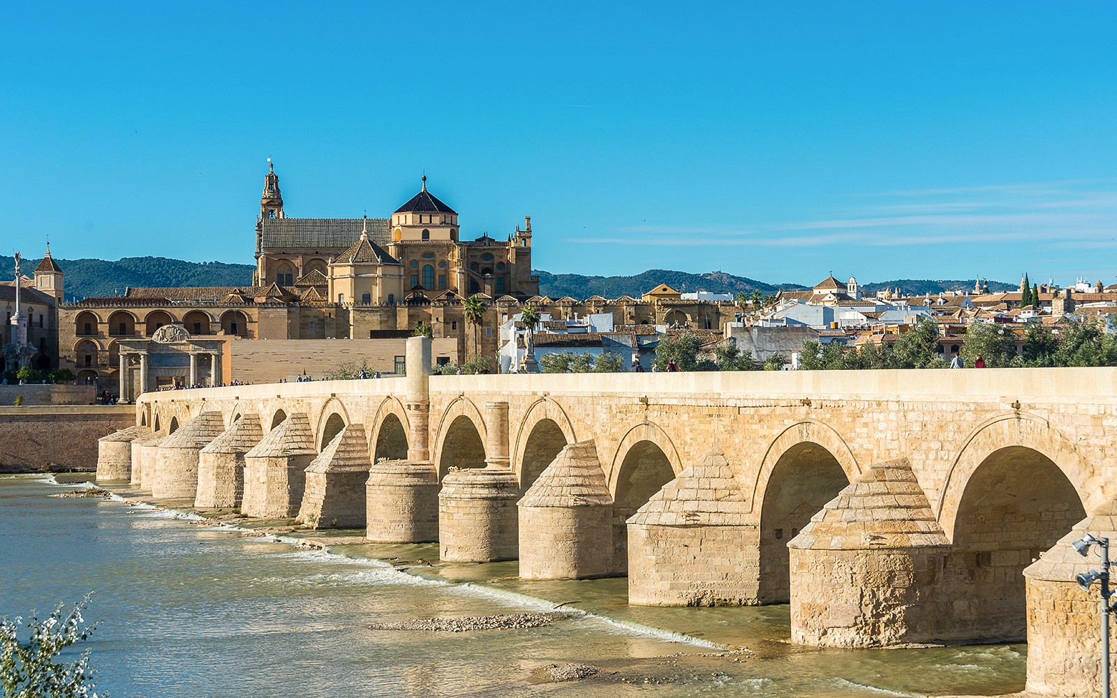 Roman Bridge and Mosque-Cathedral in Cordoba, Spain, viewed from the Guadalquivir River.