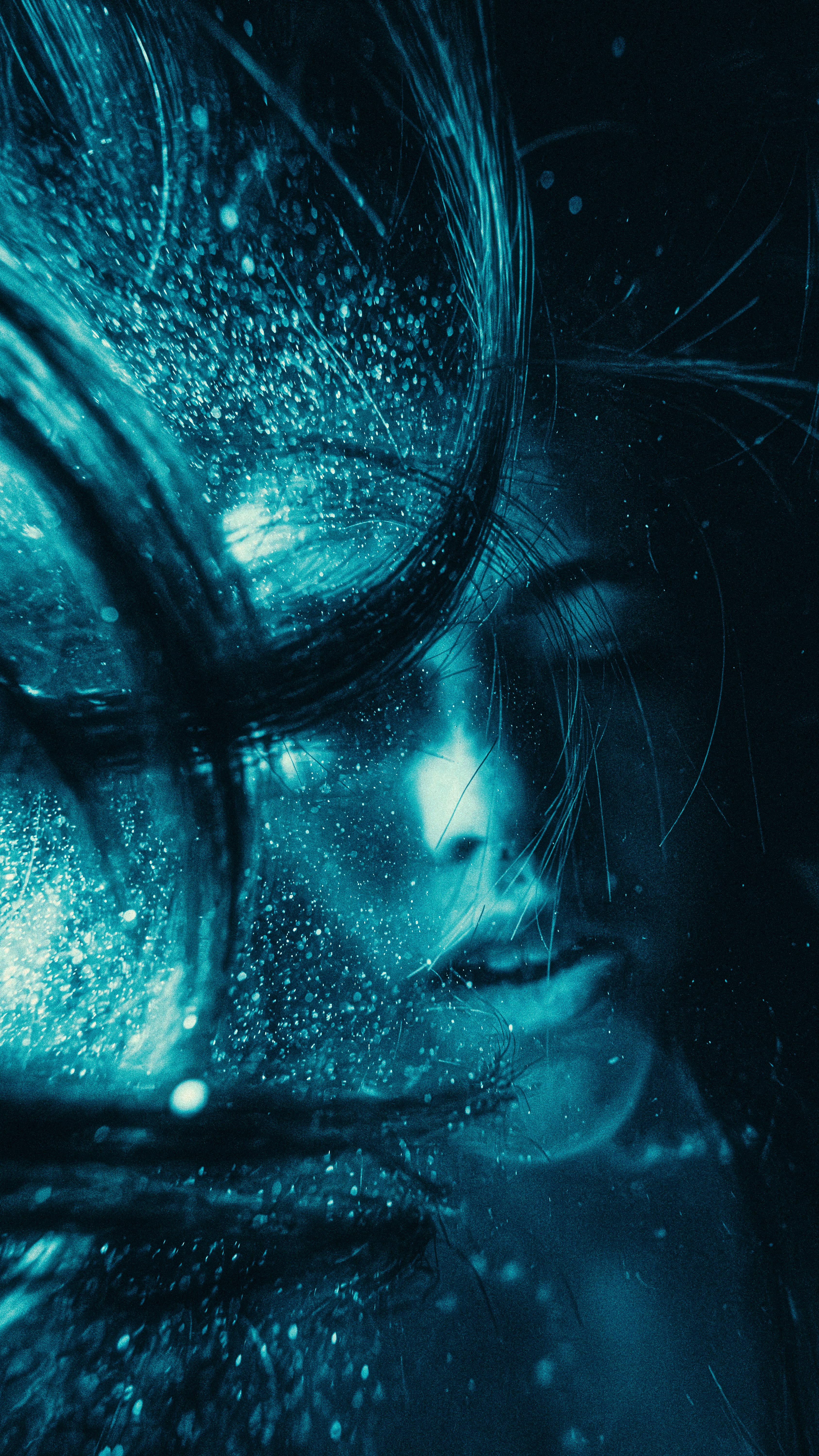 Close up of a woman's face with glitter.