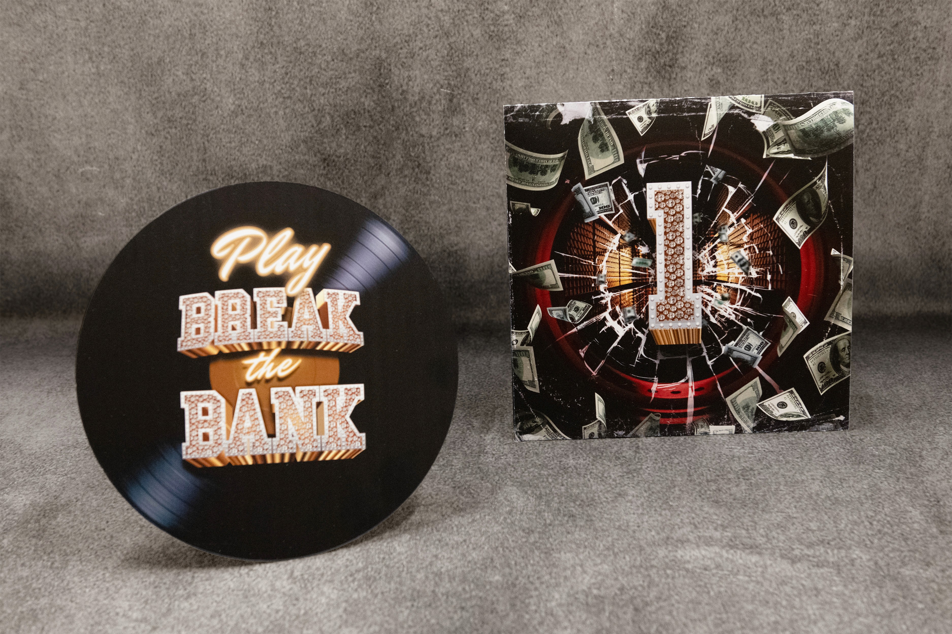 Break the Bank prize and sleeve reading "Play break the bank"