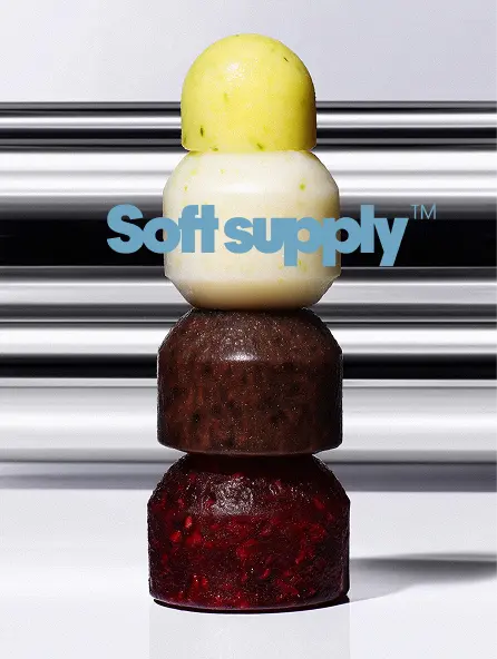 Stacked sculptural objects with soft, rounded forms and varied textures, exploring balance and material contrast.