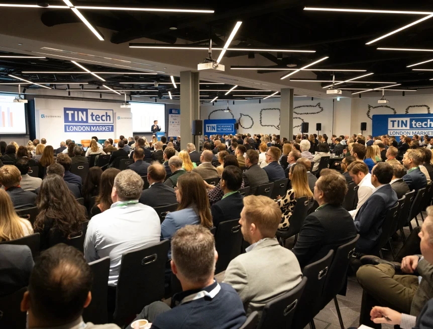 People attending a talk to TINTech London Market Conference