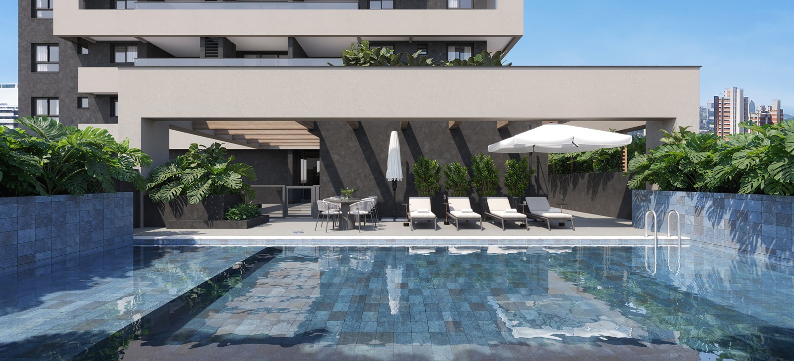 Curved modern skyscraper against a clear blue sky.