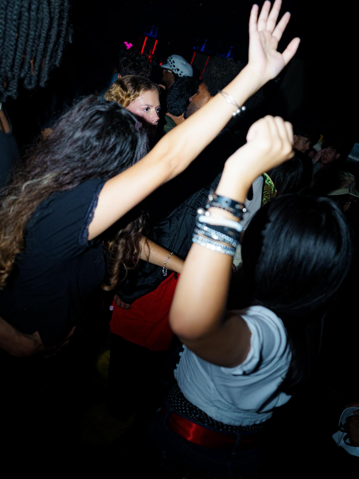 Blurred motion of a dancer with flowing movement against a soft background.