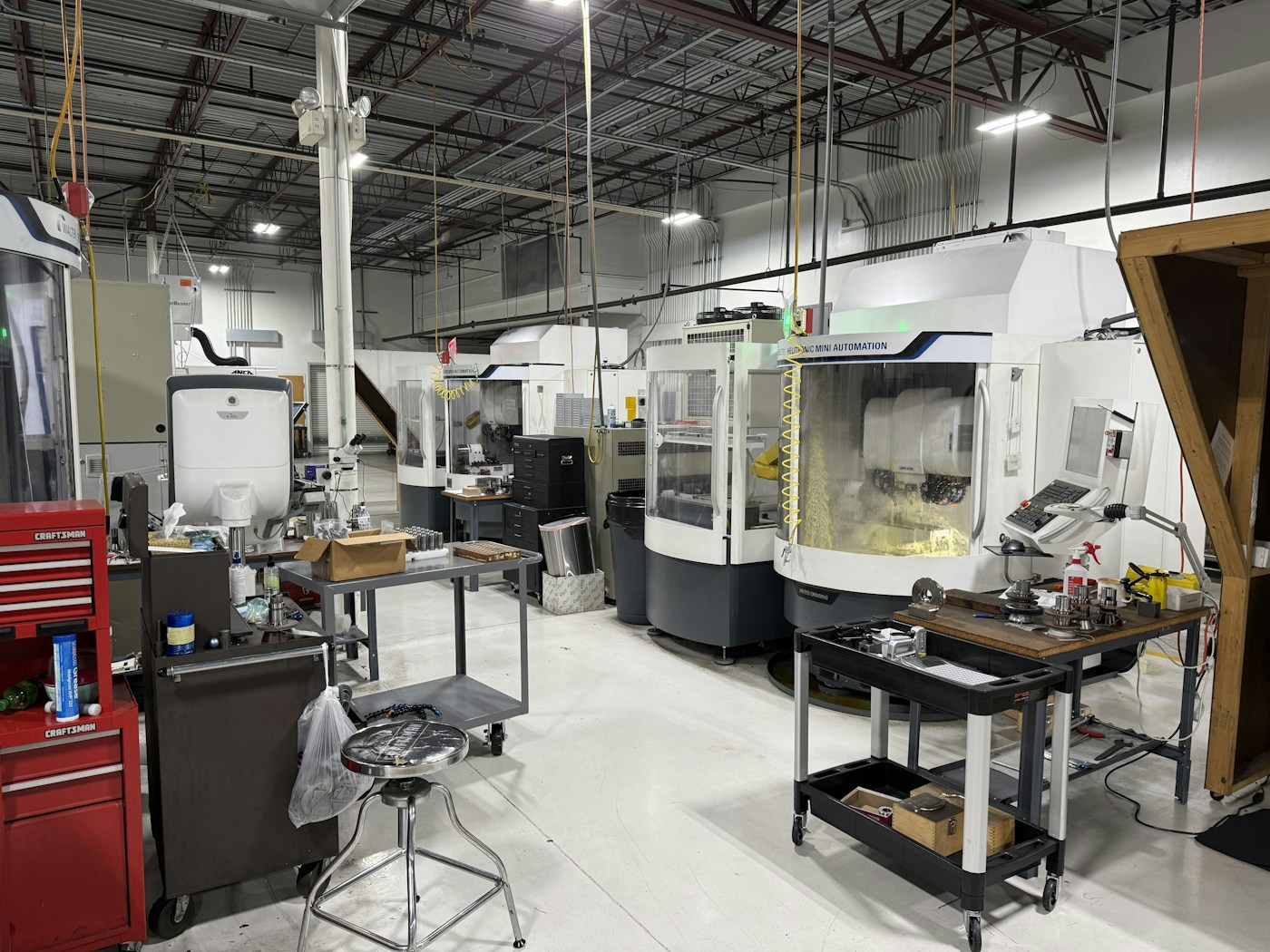 CNC machines and metalworking tools in an industrial manufacturing workshop