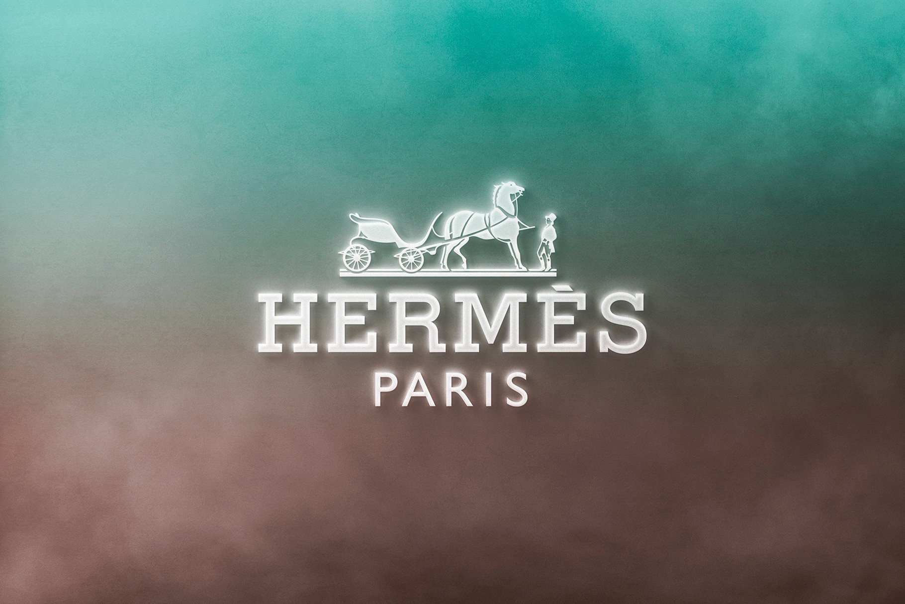Luxury Hermès Paris logo mockup with a silver foil effect on a teal background.