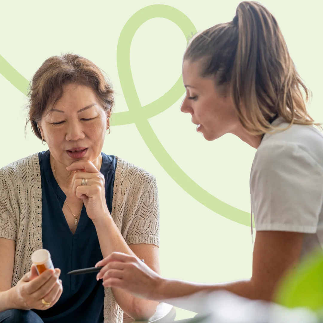 Older woman receiving bladder management care from community nurse at home in Brisbane