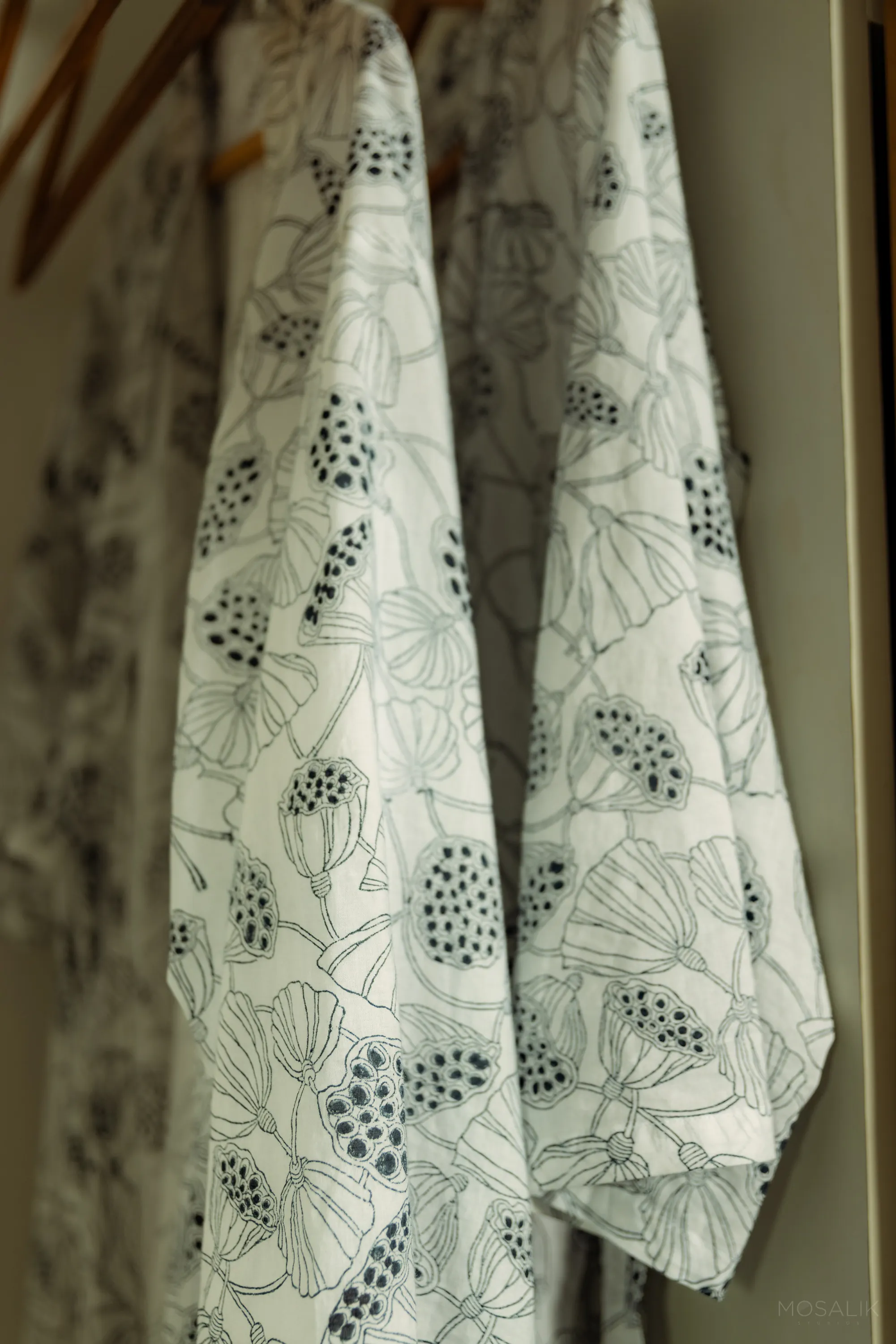 Block-printed robes in a Jaali Blue wardrobe