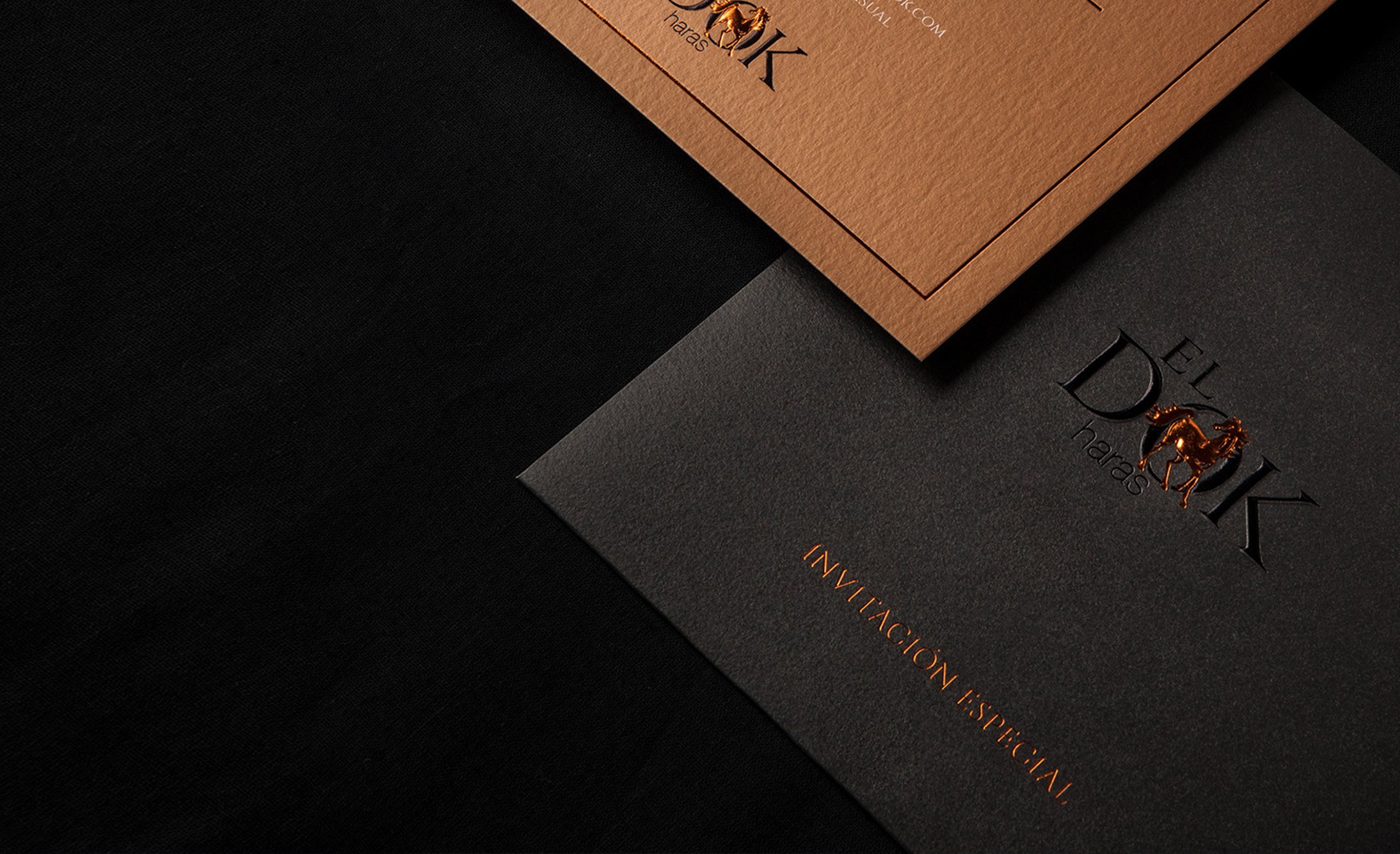 A brown and black envelopes.