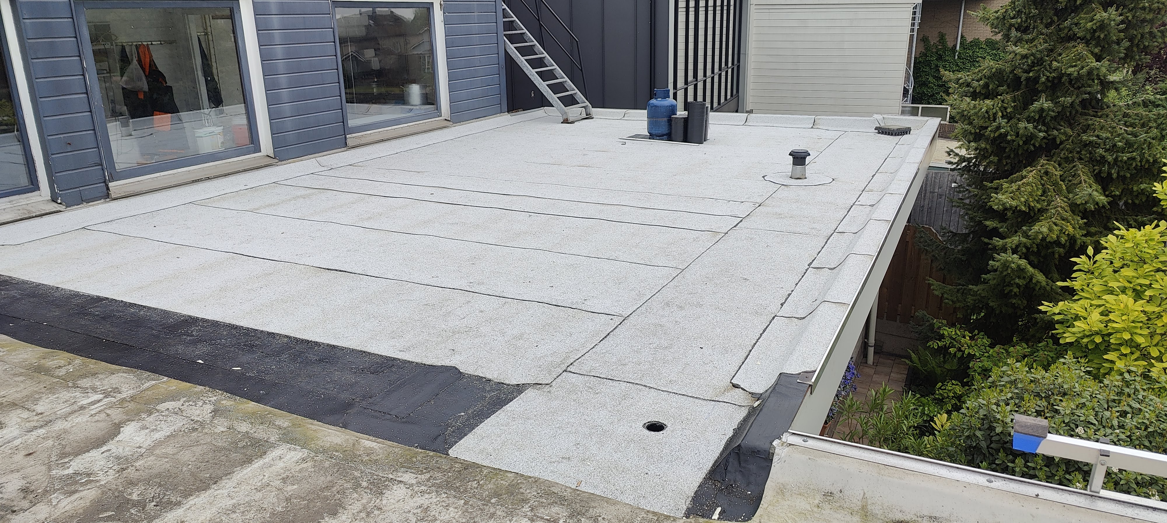 Man Working On a roof