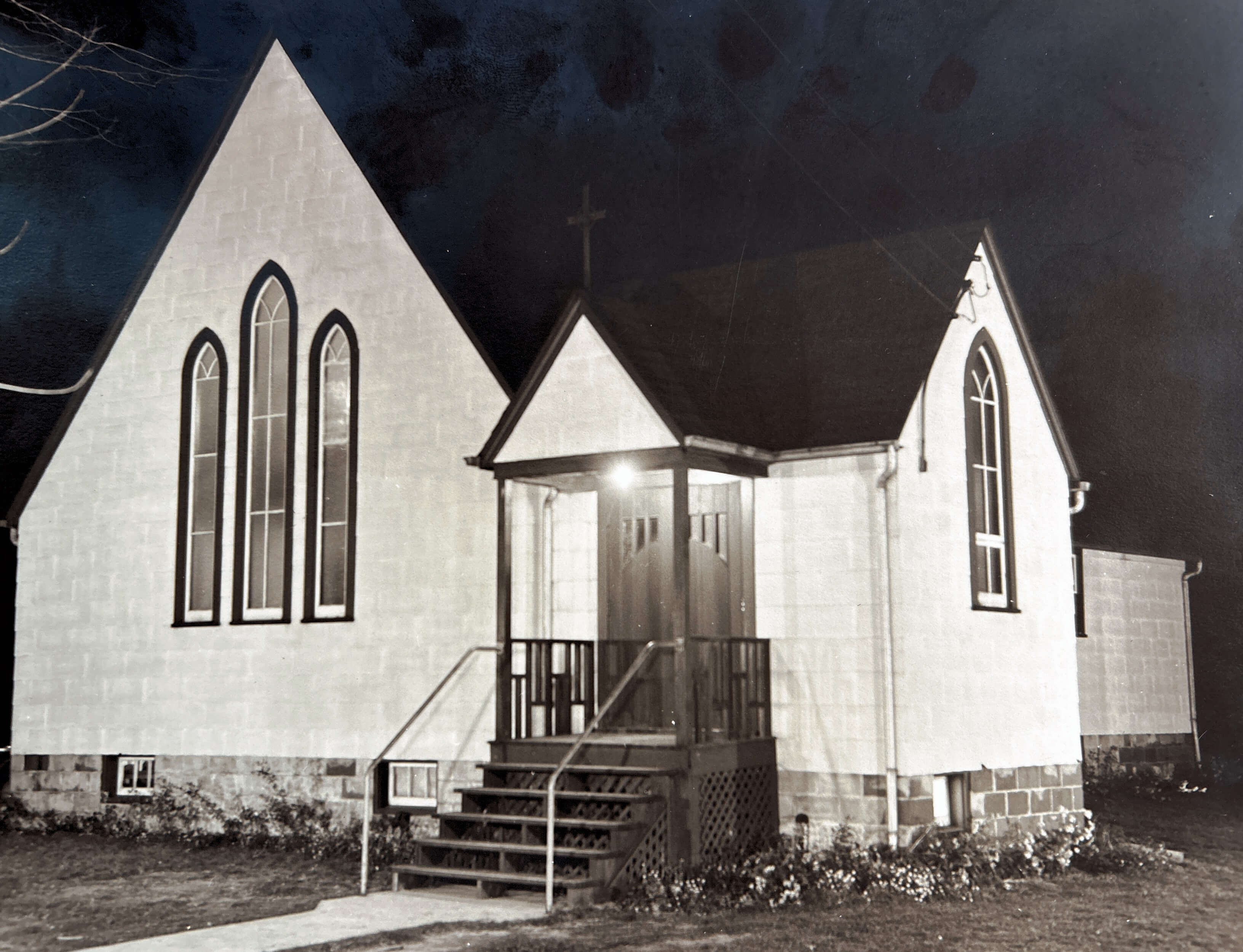 A black and white picture of a church