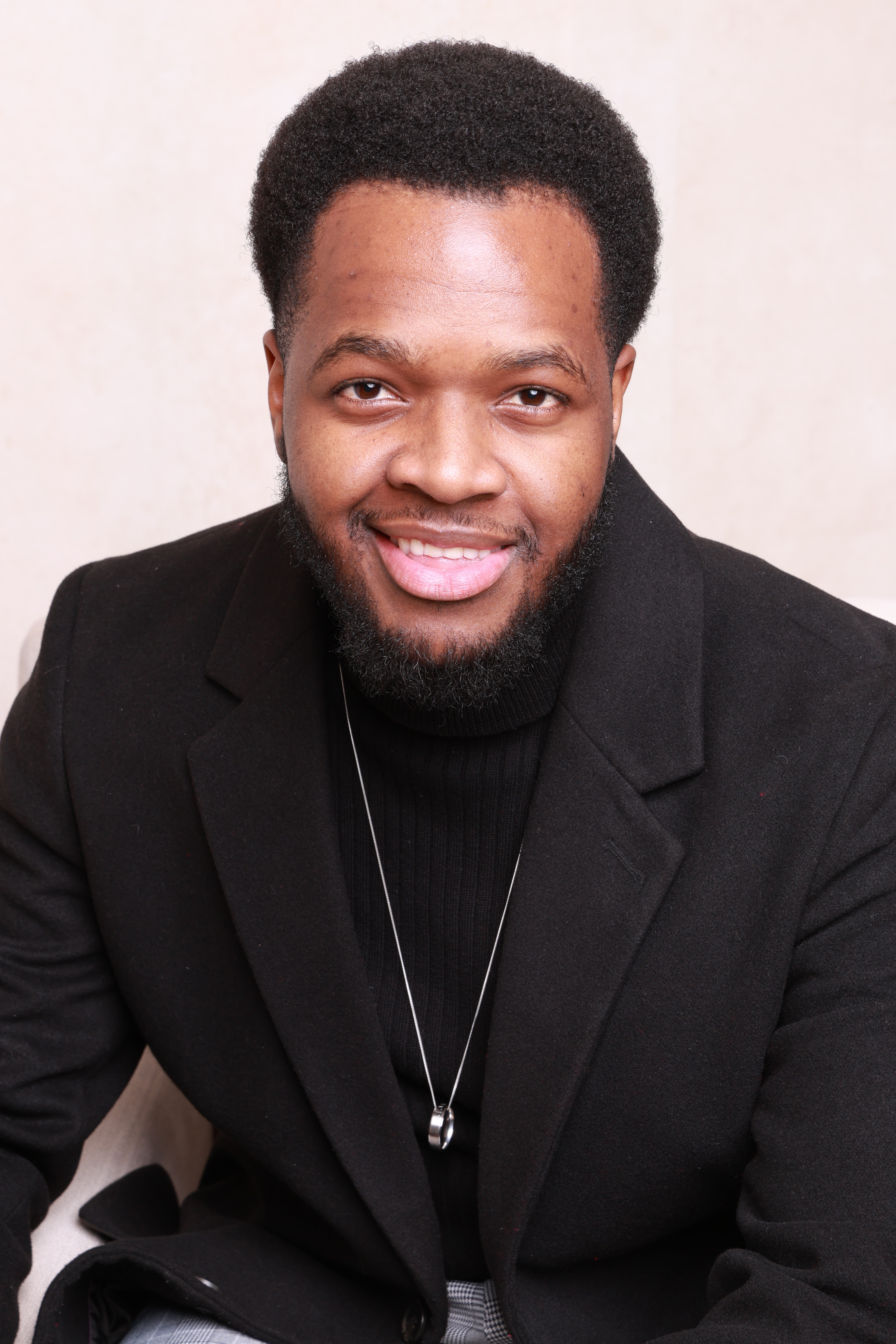 a blurry photo of a person standing in front of a wall