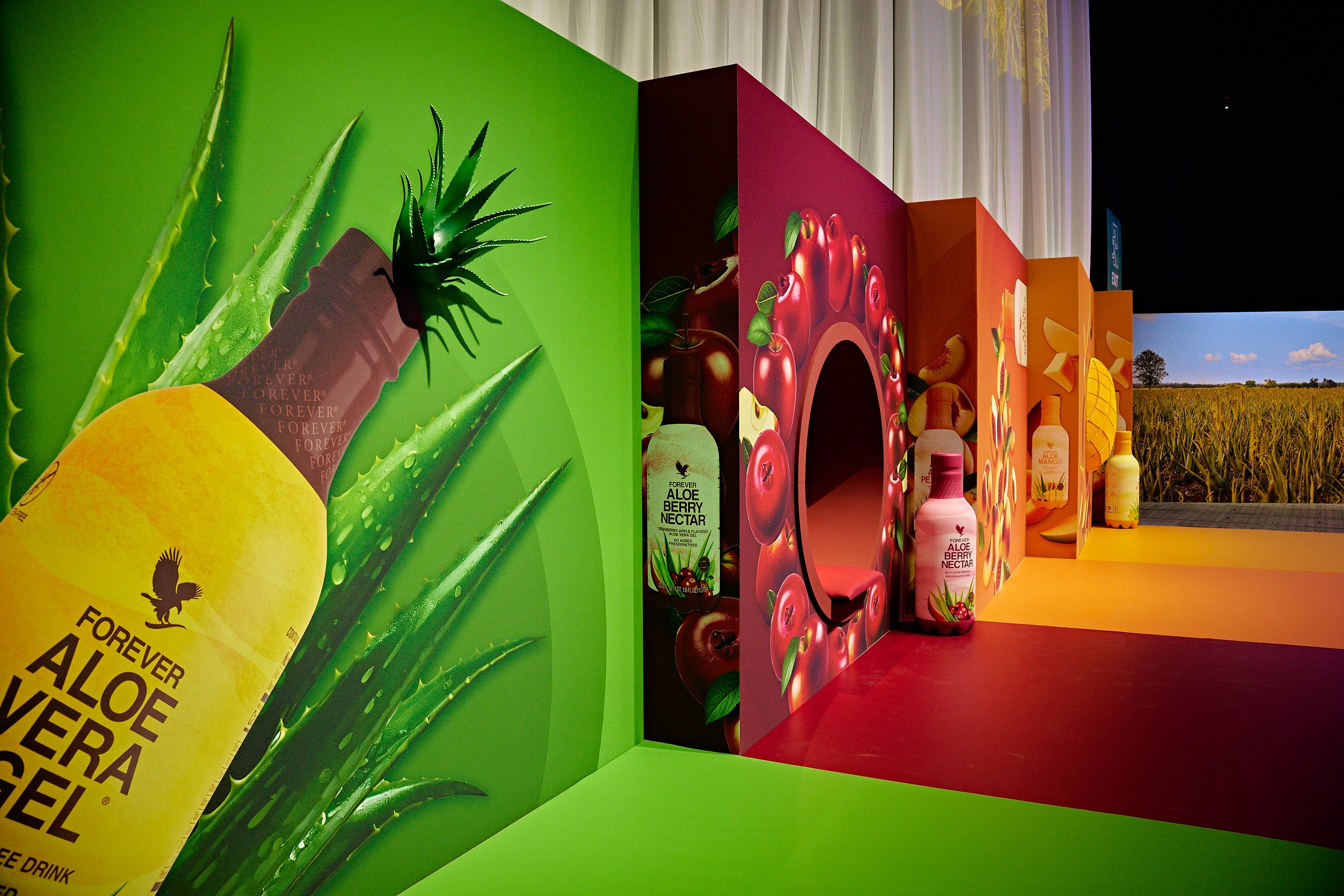 Image showcasing the Aloe Vera Gel interactive exhibition area for Forever Living FGR25 Paris event.