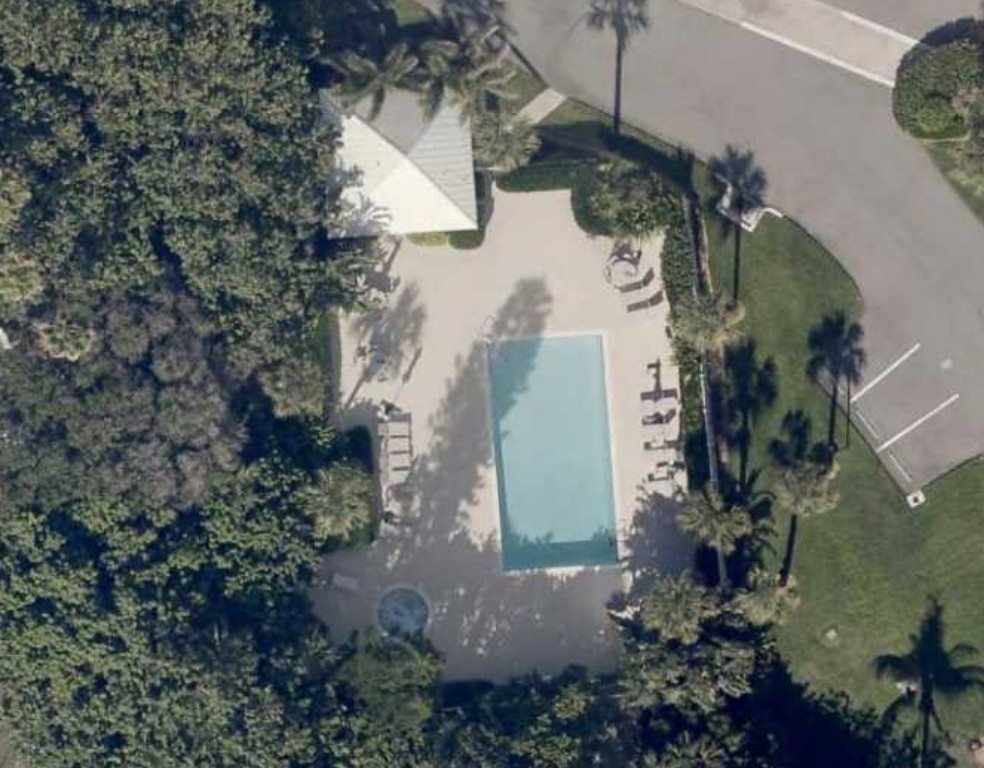 2000 New Roof Construction in Sea Oaks Beach Villas, Vero Beach with Entegra Flat Tile in White