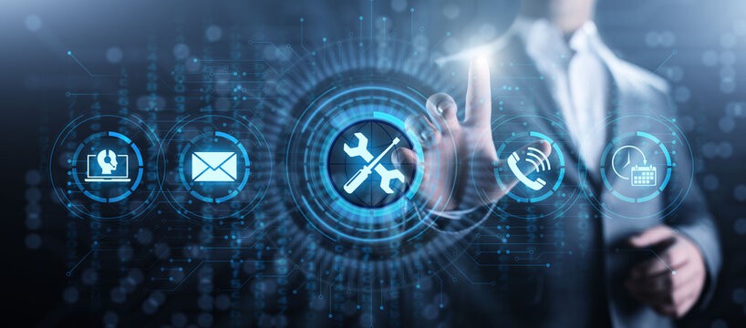 man wearing gray polo shirt beside dry-erase board