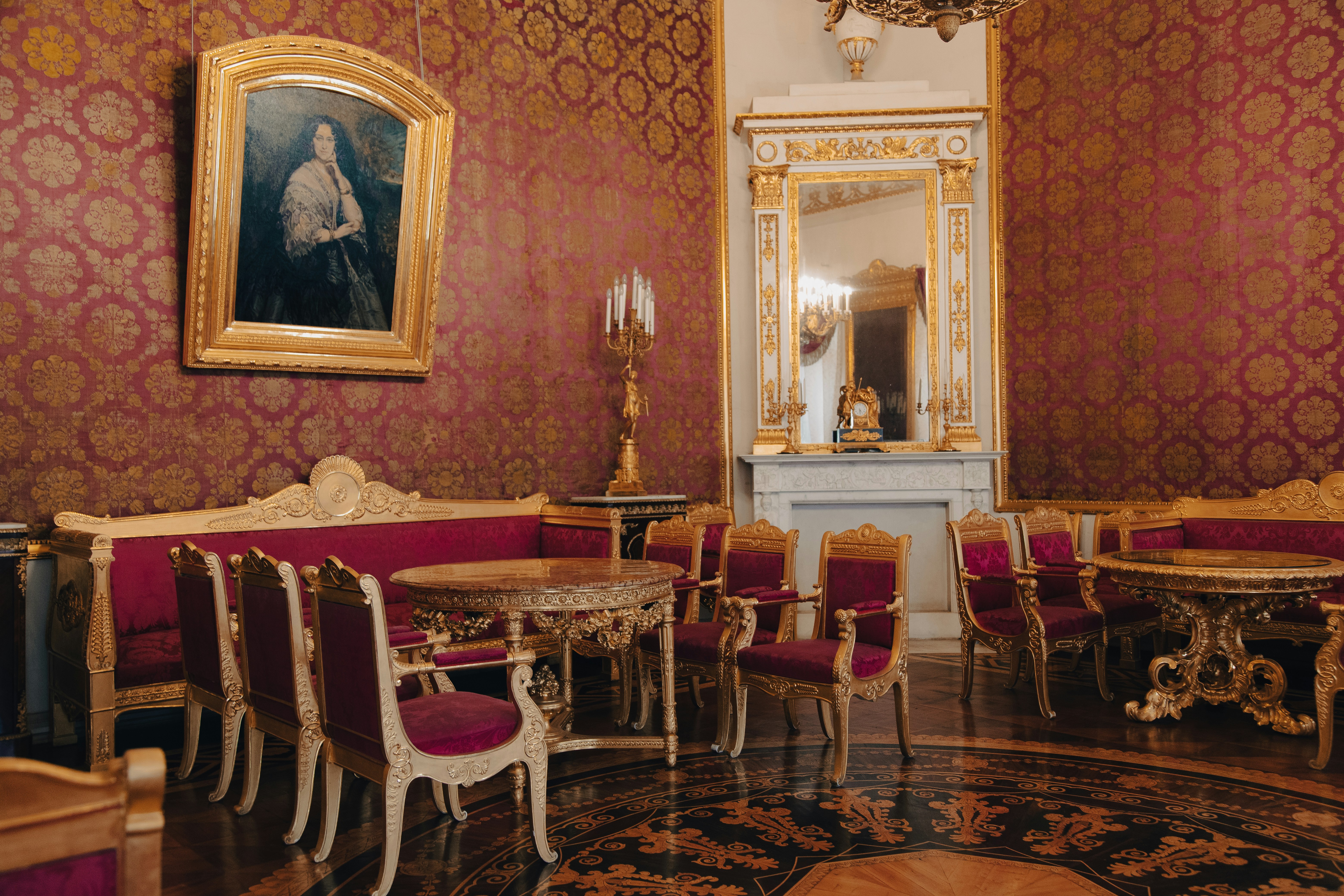 A traditional dining room with classic furniture and elegant interior details.