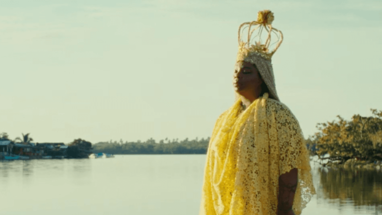Patrisse Cullors in yellow