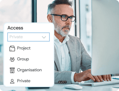Professional reviewing digital access settings with options for private, group, and organisation permissions.