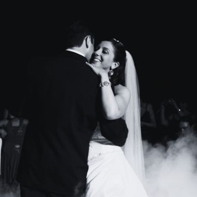 The bride and groom sharing a special dance, surrounded by the vibrant atmosphere created by NightStyle DJs, as they celebrate their love with family and friends.