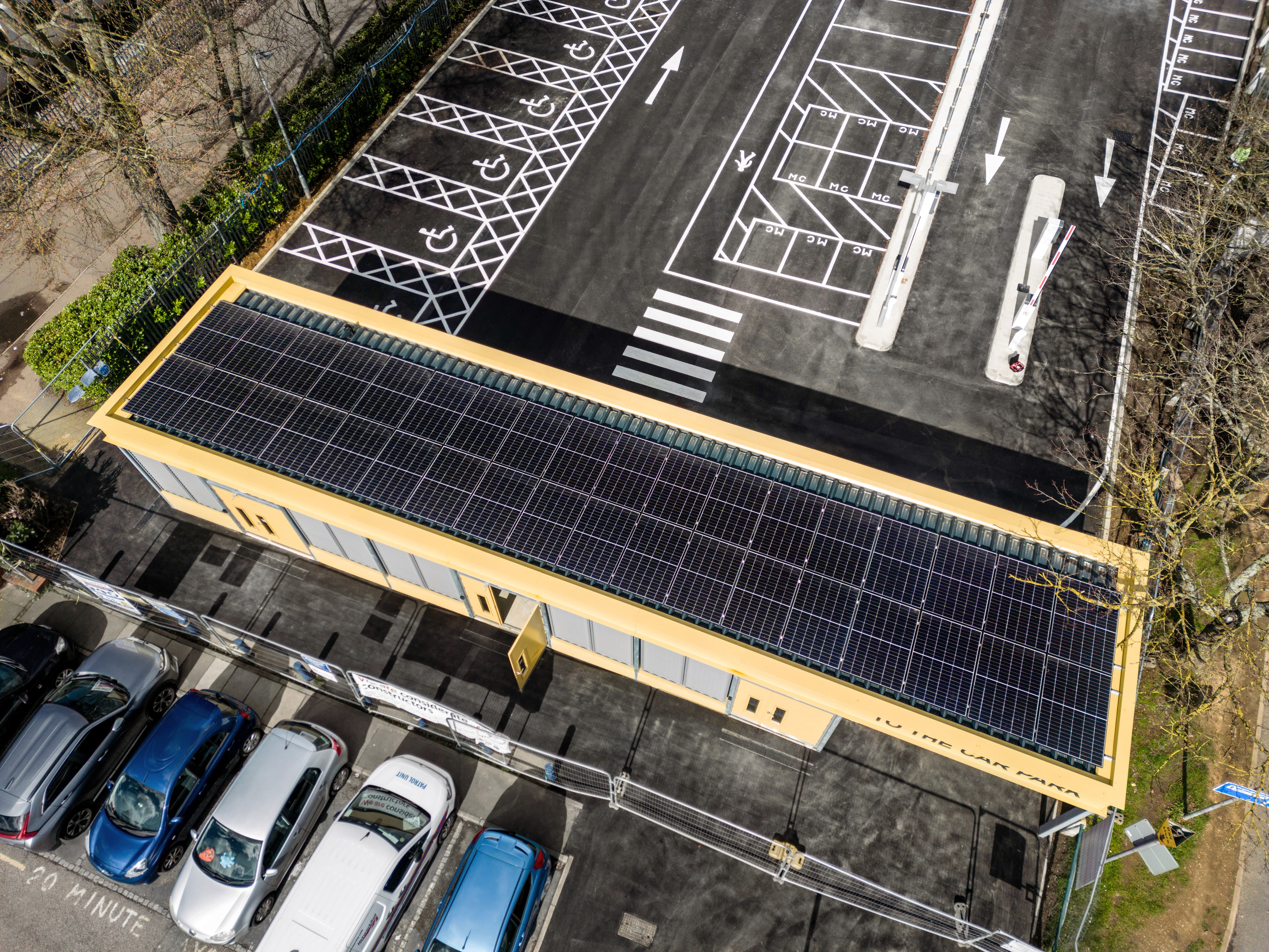A birds eye view of Stevenage Railway North Secure Cycle Parking, showing the roof of the facility with solar panels.