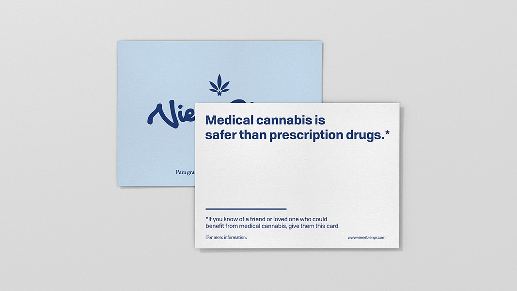 Two light blue cards are displayed on a light gray background. The top card features the dark blue logo “Nie” with a stylized cannabis leaf icon and the word “Para gra” beneath it. The bottom card displays a white background with bold dark blue text reading “Medical cannabis is safer than prescription drugs.” Below the text, a thin horizontal black line separates it from the smaller text: “*If you know of a friend or loved one who could benefit from medical cannabis, give them this card.” At the bottom right, a website address, “www.vieneblgrp.com,” is printed.