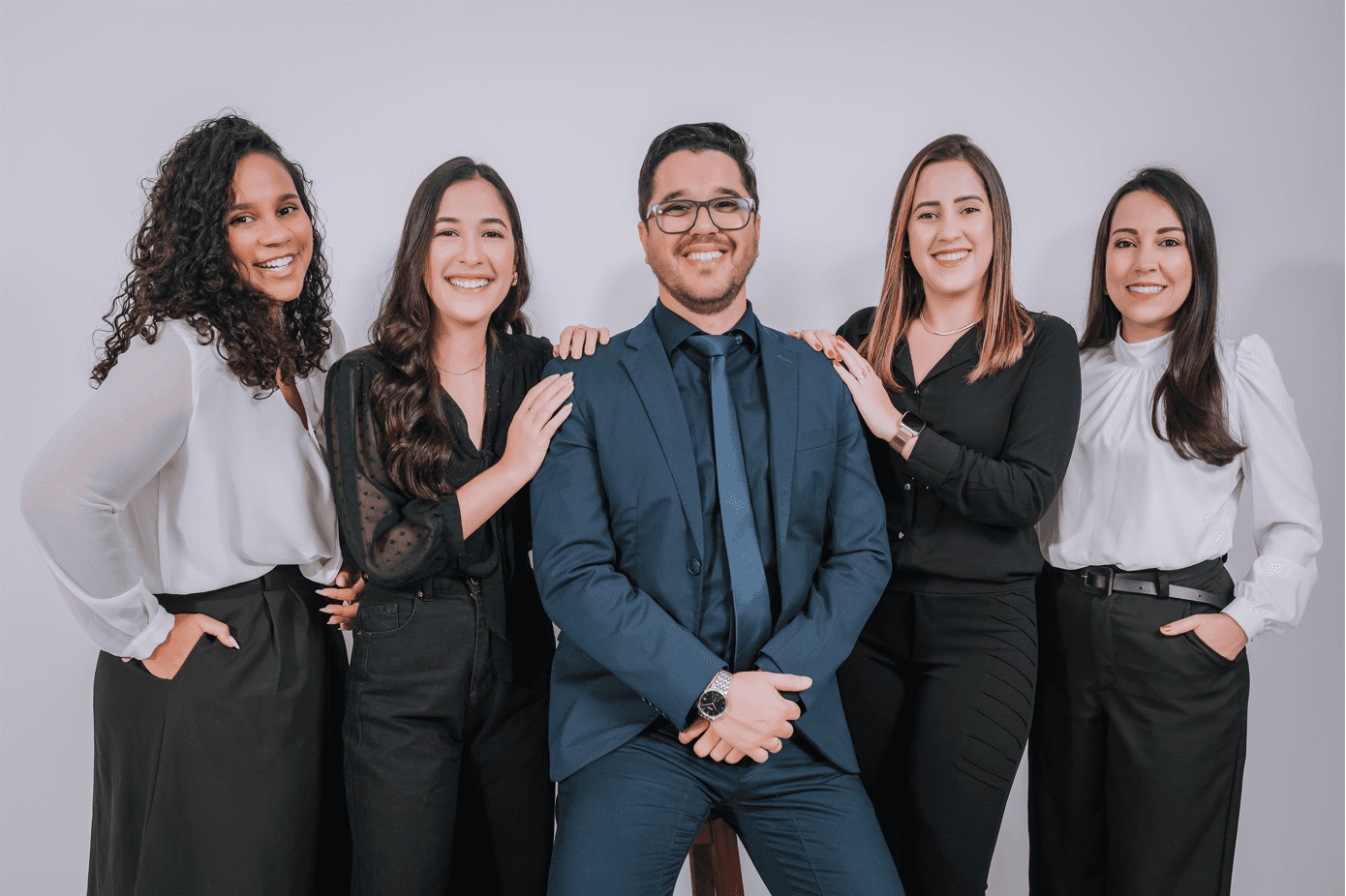 Foto dos profissionais da Nucore sorrindo.