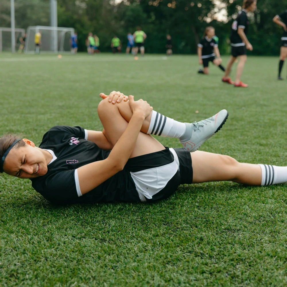 A woman with a shin and leg injury