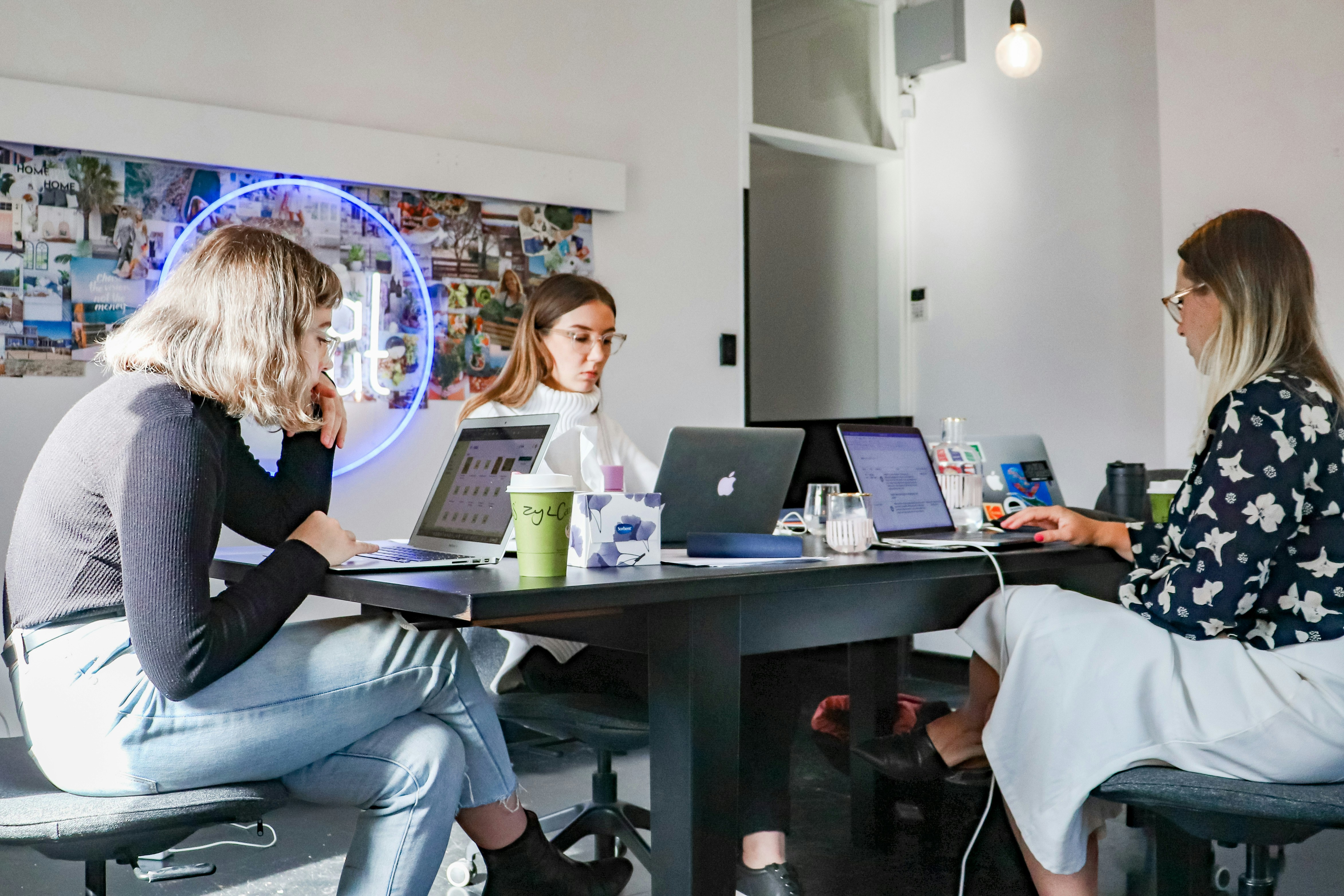 Woman Sitting across Table  - Free AI Tools for Research 