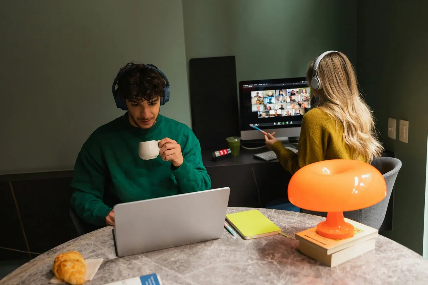 two women and one man on computer screen