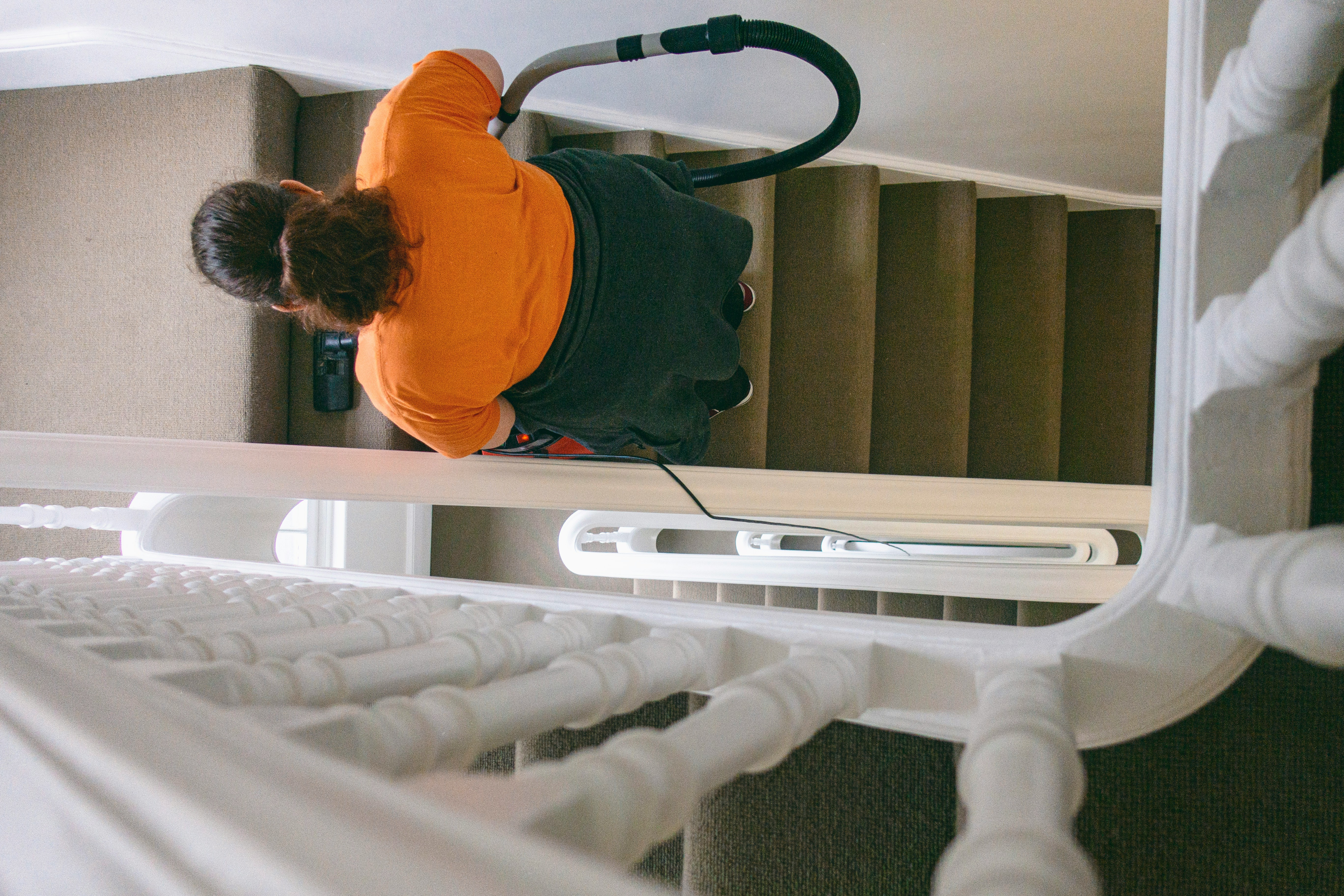 woman climbing up stairs