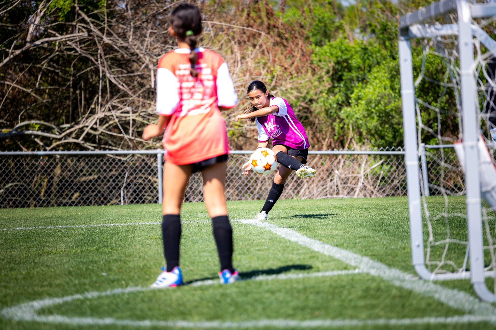Lake Wales Soccer Club player striking the ball