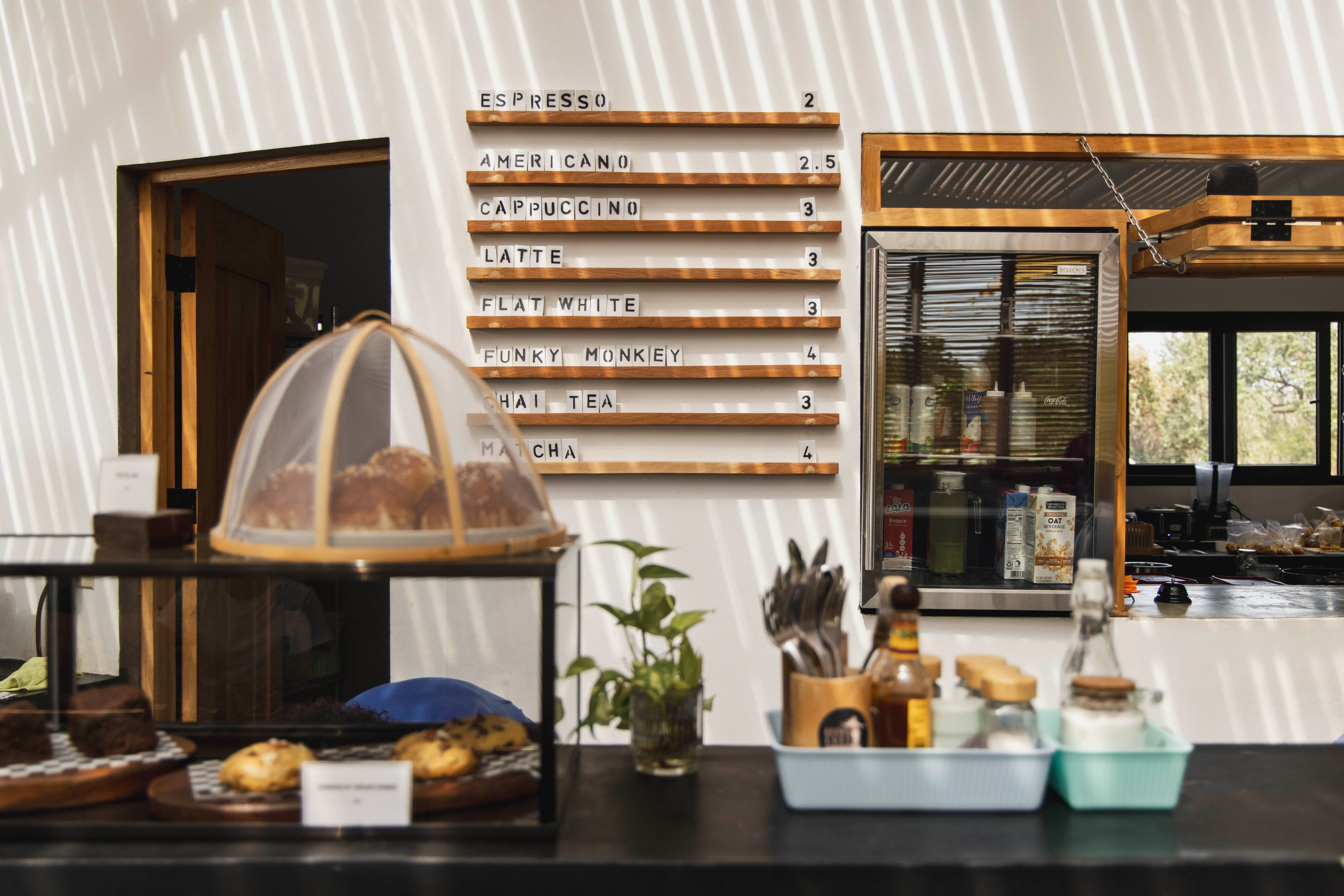 Kooks Cafe surf cafe by Costa Architecture, Popoyo Nicaragua — service counter