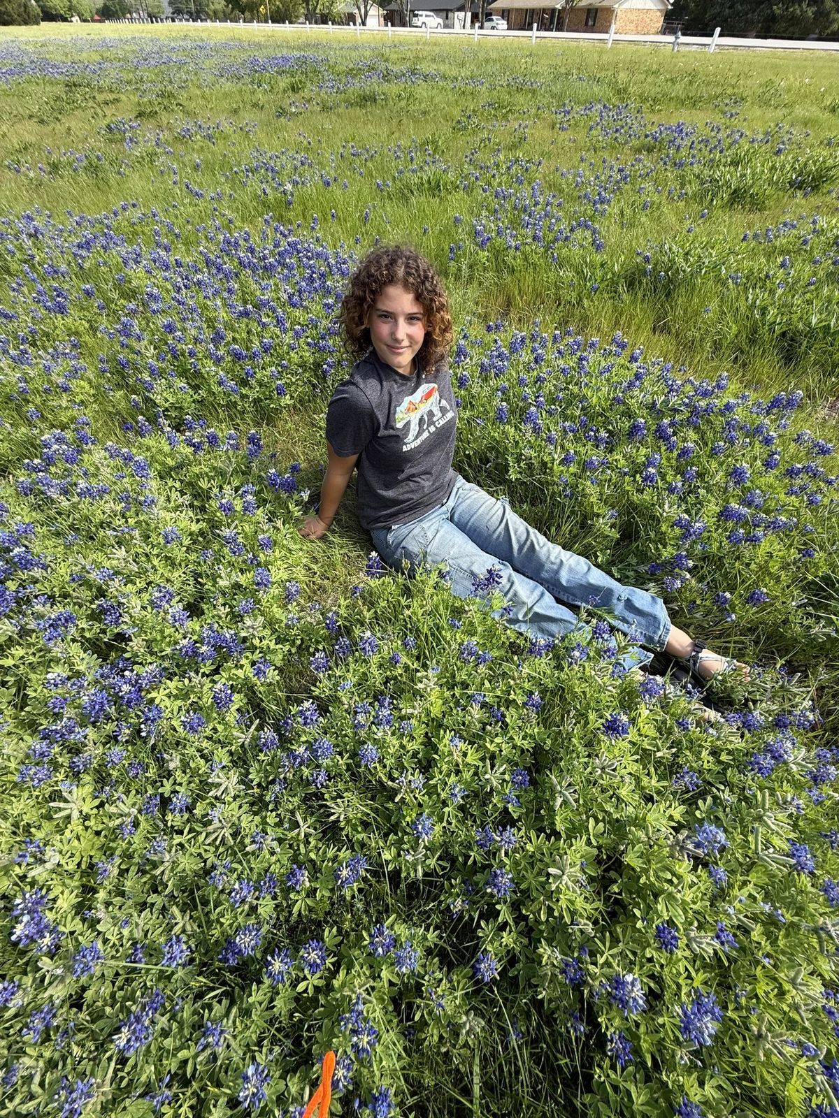 Eden standing in a field of Texas bluebonnets near Forney