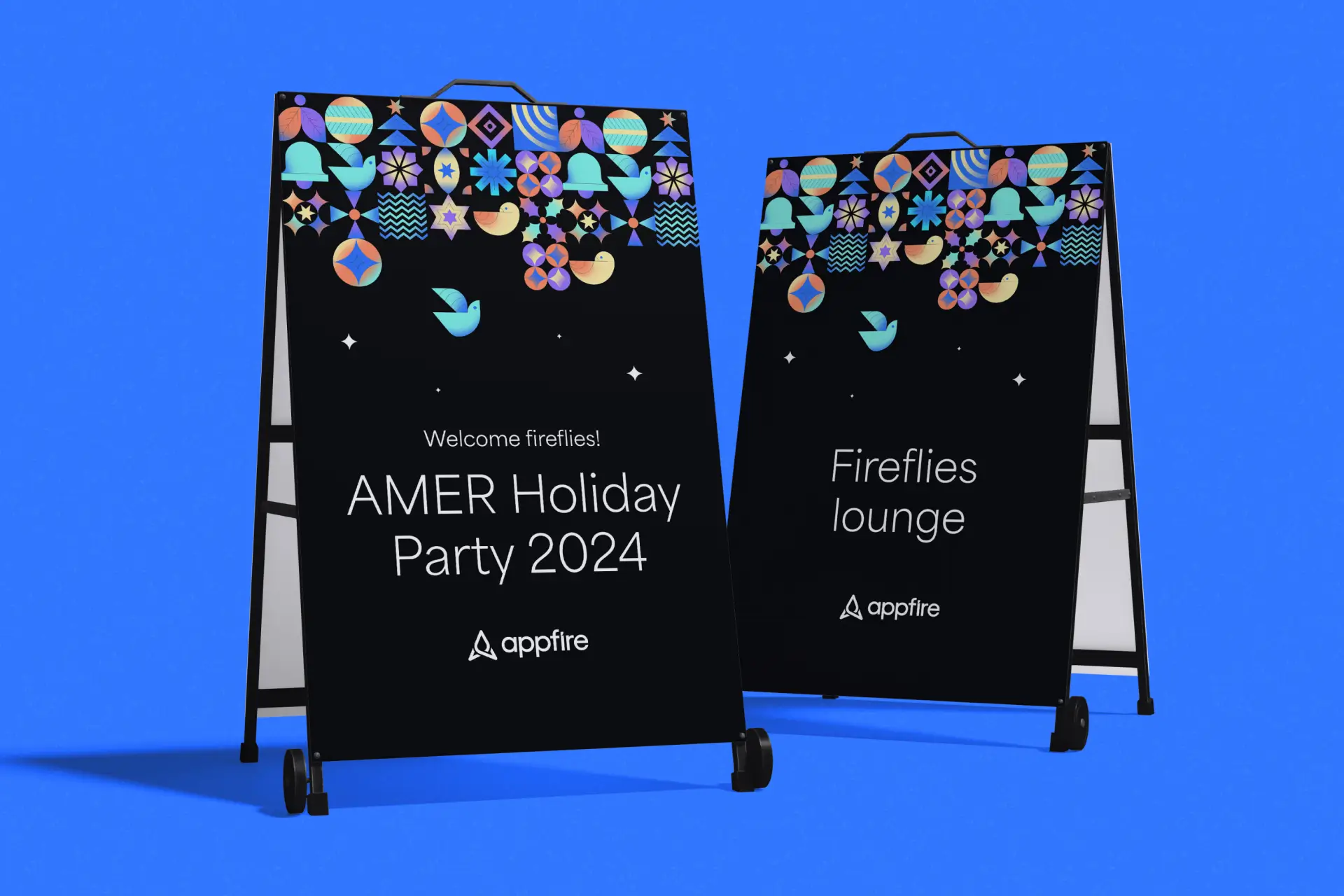 Two black signboards on a blue background display text for "AMER Holiday Party 2024" and "Fireflies lounge" with colorful geometric patterns above.