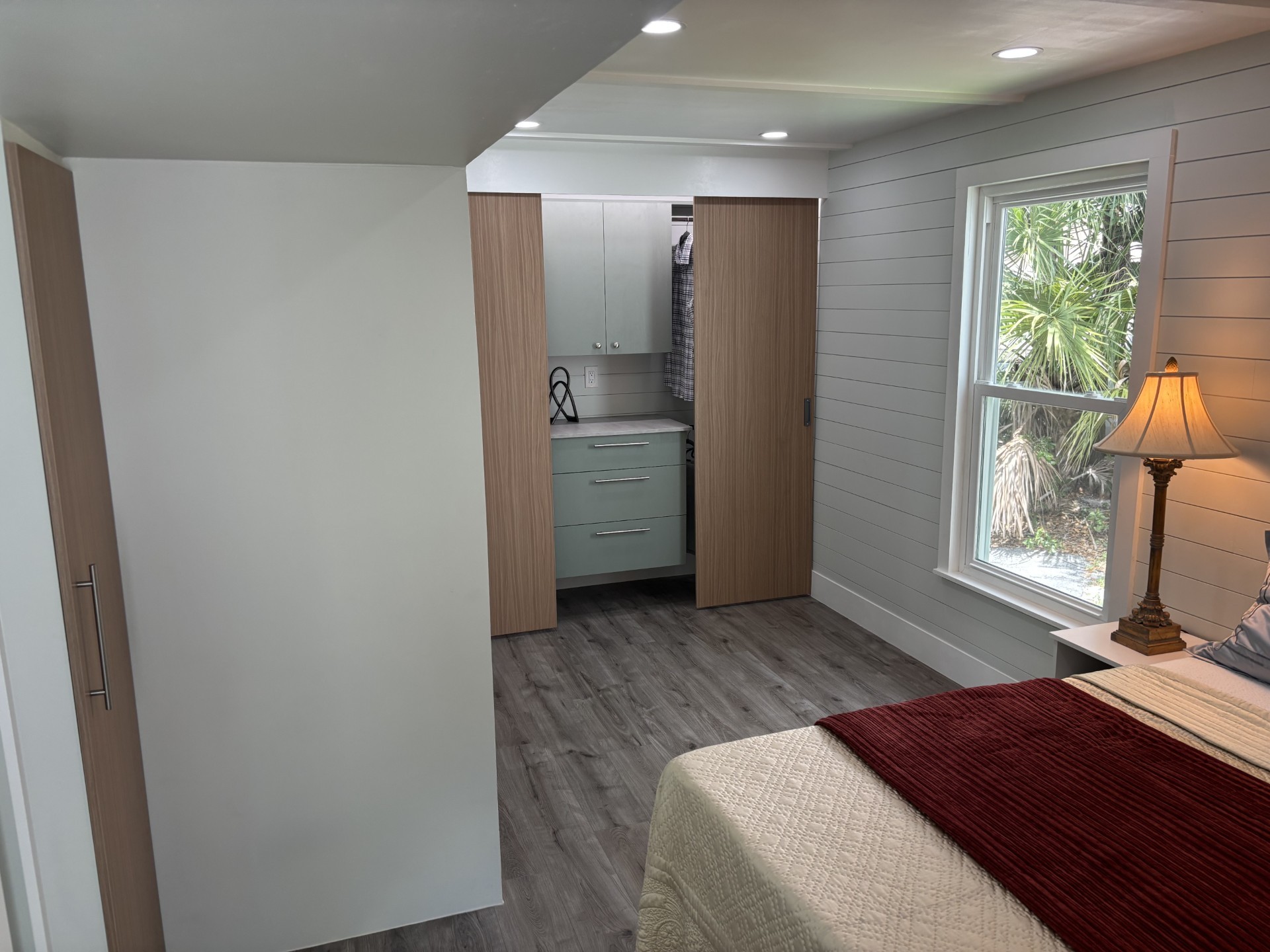 Small backyard ADU exterior with modern siding