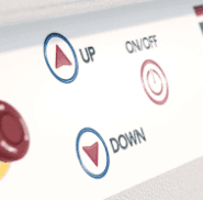 Close-up of the Elevate Glide control panel showing the up and down directional buttons and on/off switch