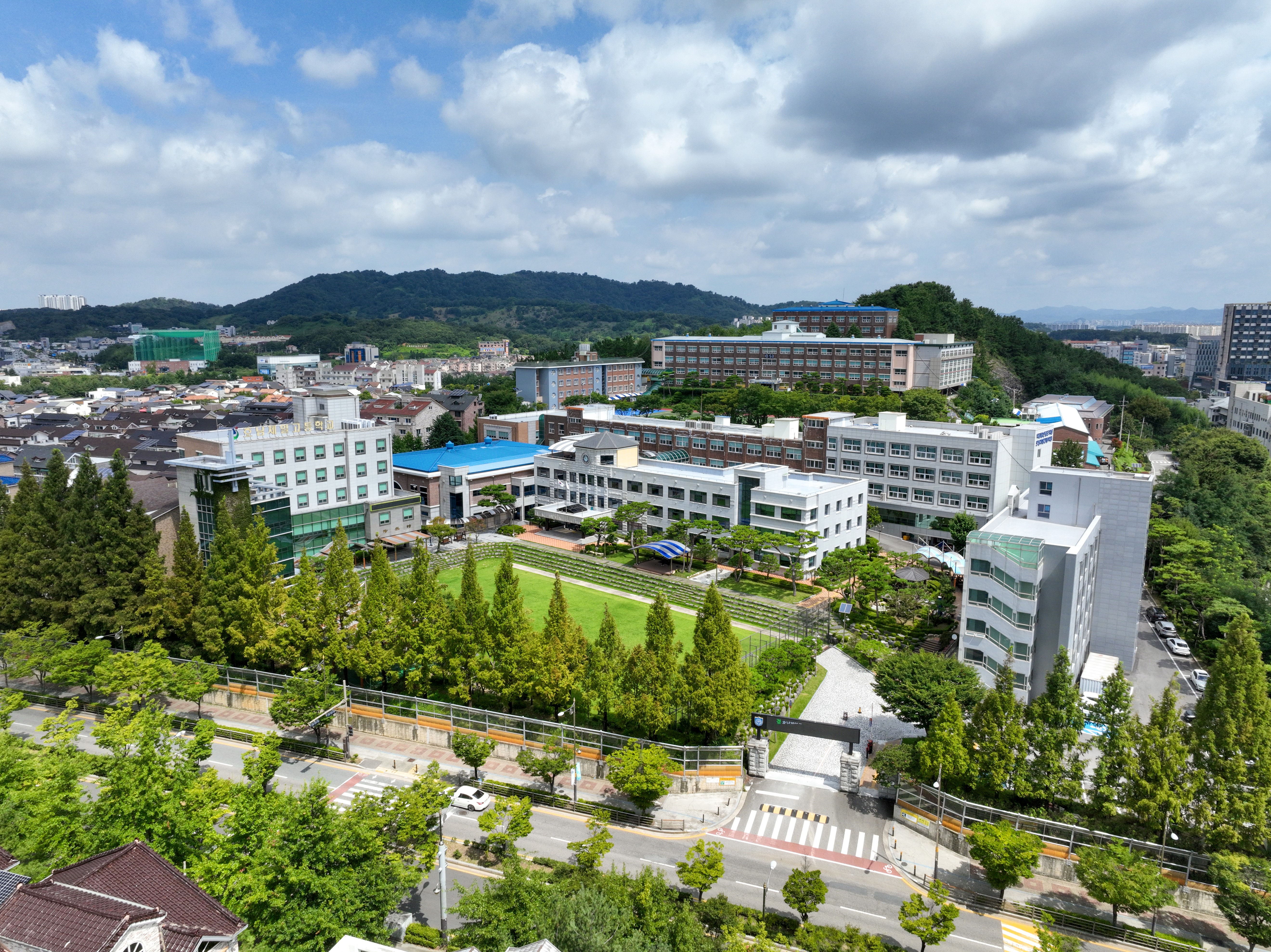 A group of young men standing next to each other
