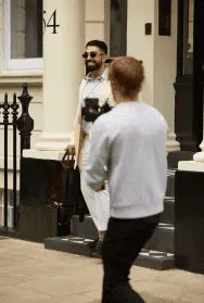 Woman with black tape on her face