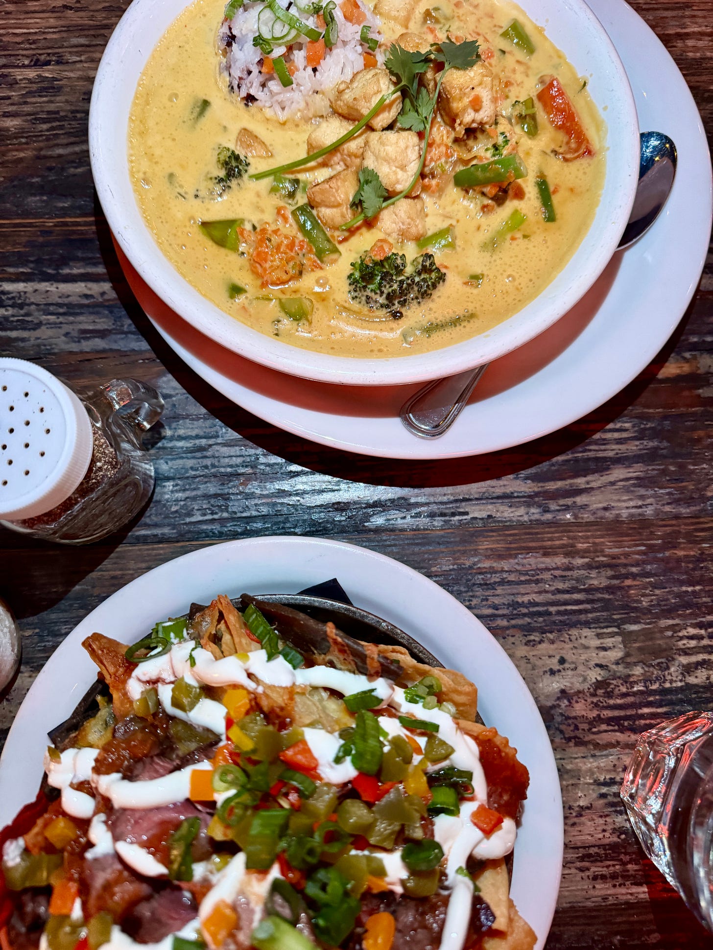 Vegan coconut curry with tofu & the Newport nachos with steak