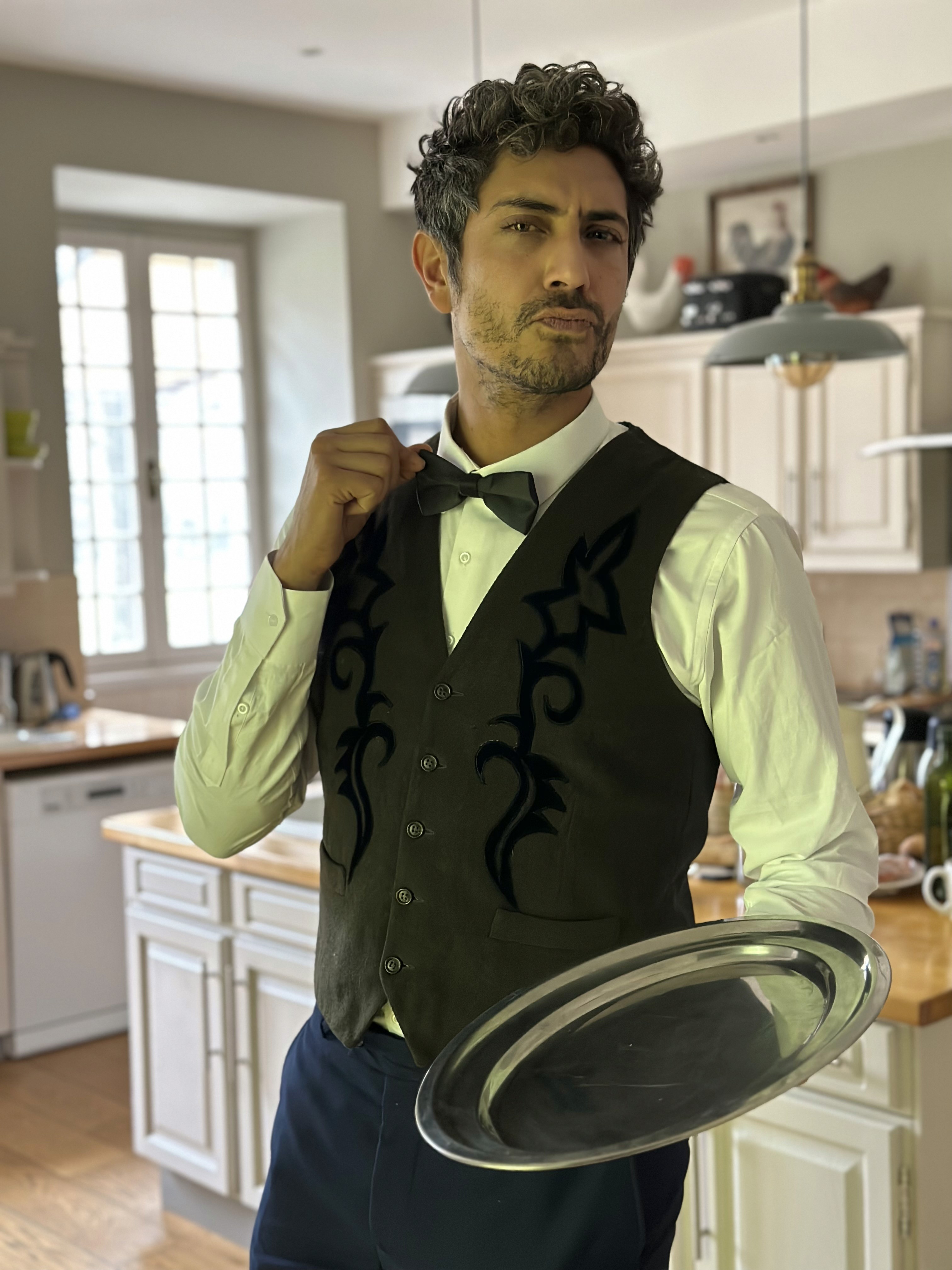 Historic storefronts line a charming small-town street.