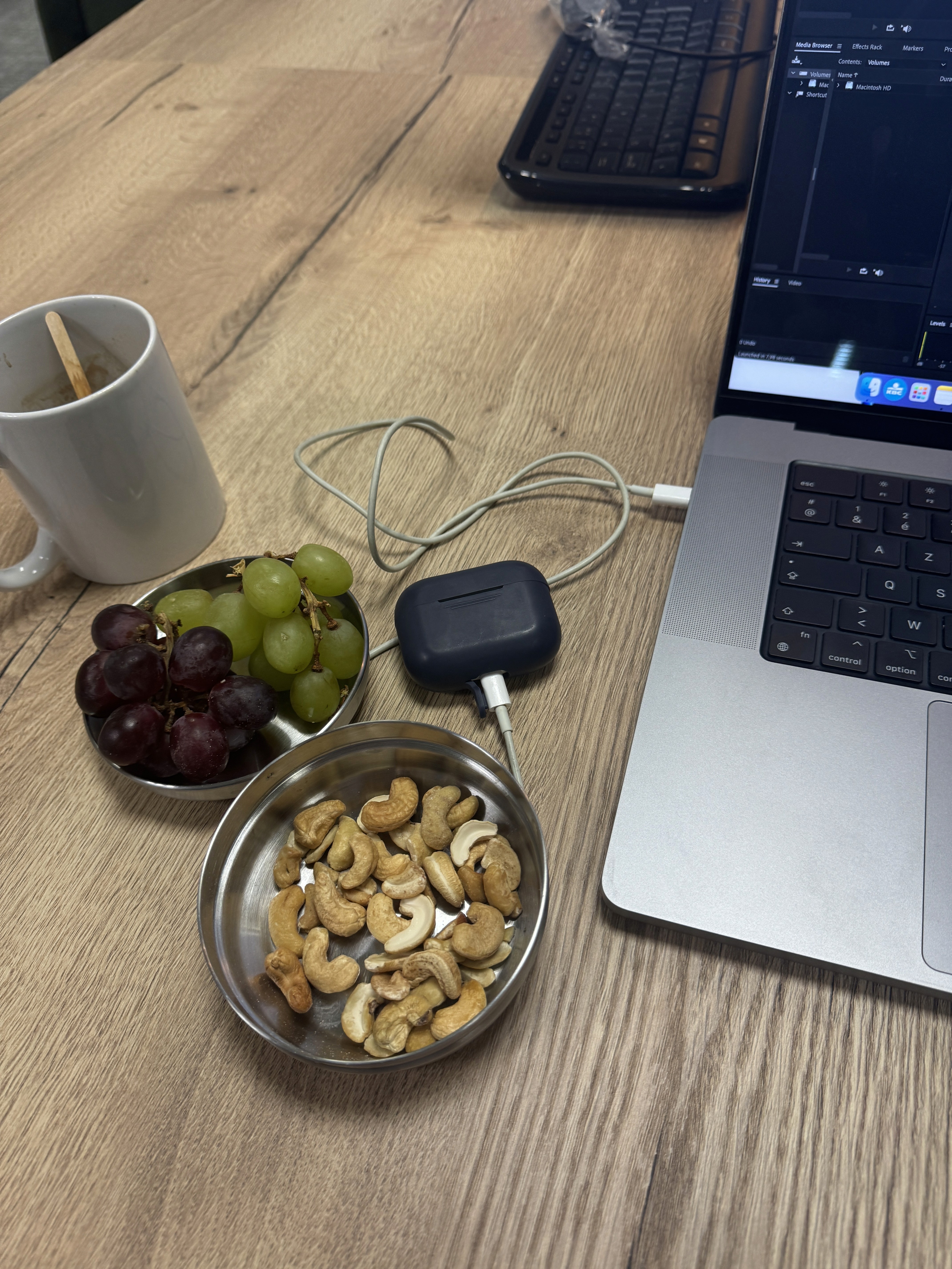 Person sitting on a ledge overlooking New York City skyline