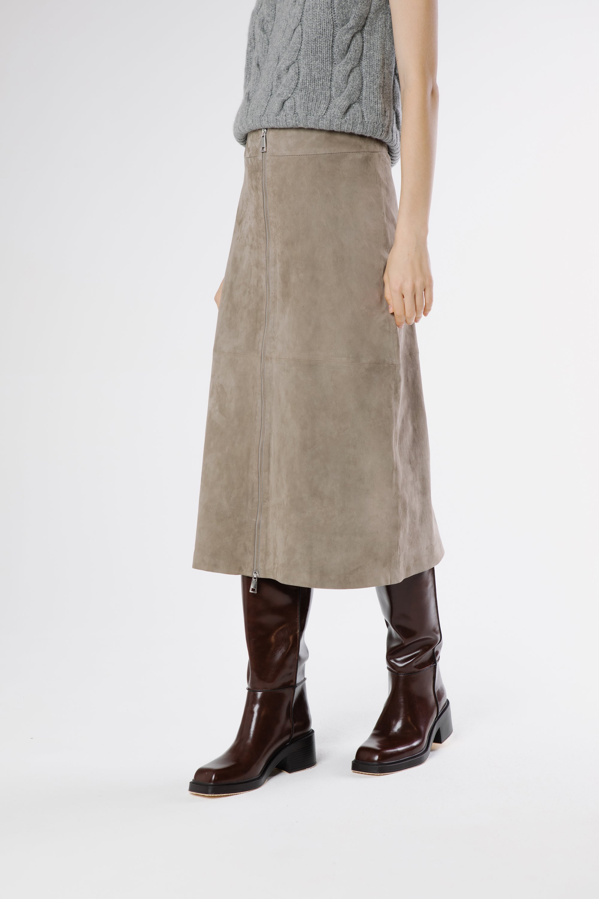 Side view of Zara suede midi skirt in drizzle grey highlighting straight fit and modern midi length.