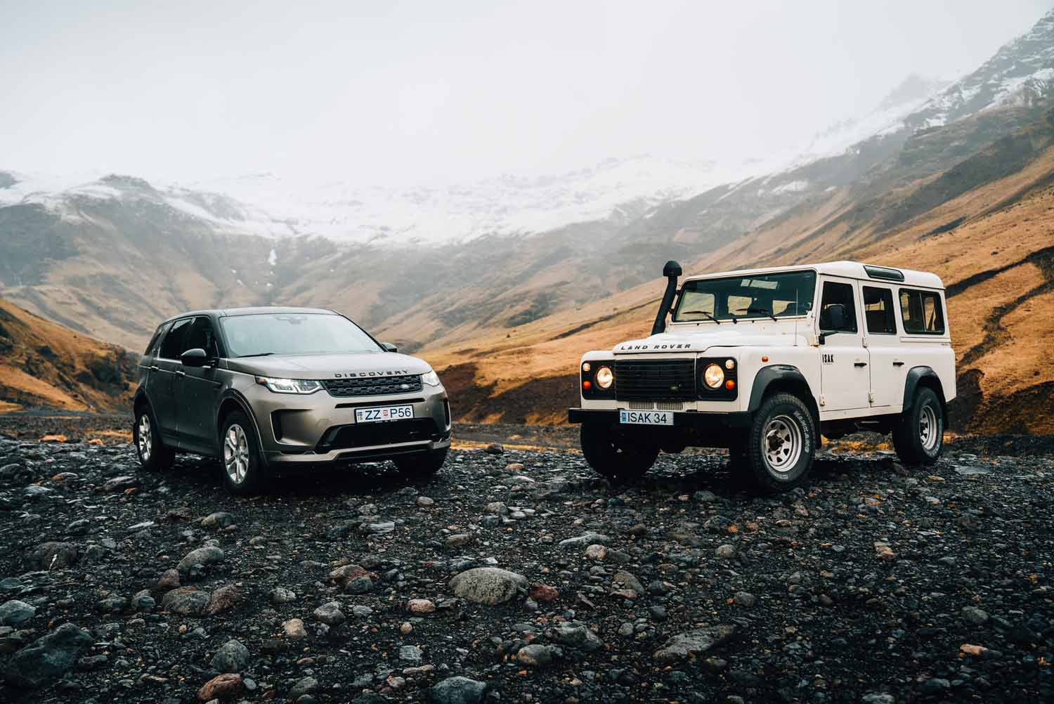 Two Land Rovers in rugged landscape; ideal for filmproduction ads.