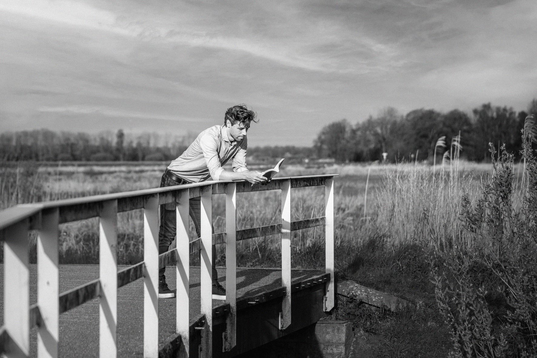 Group of people relaxing outdoors on a field or lawn