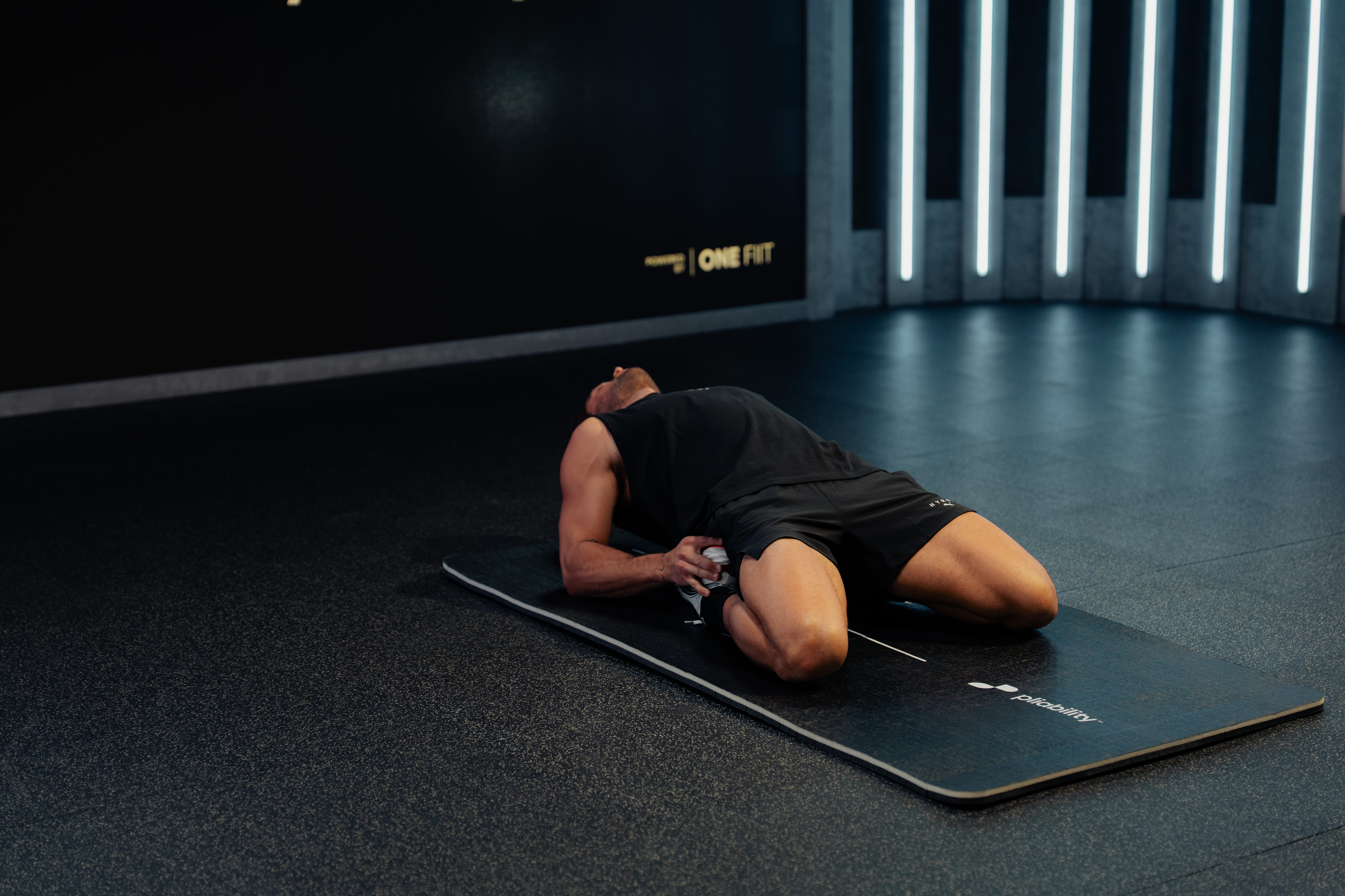 man in stretching pose - Best Supplements for Muscle Pain and Stiffness