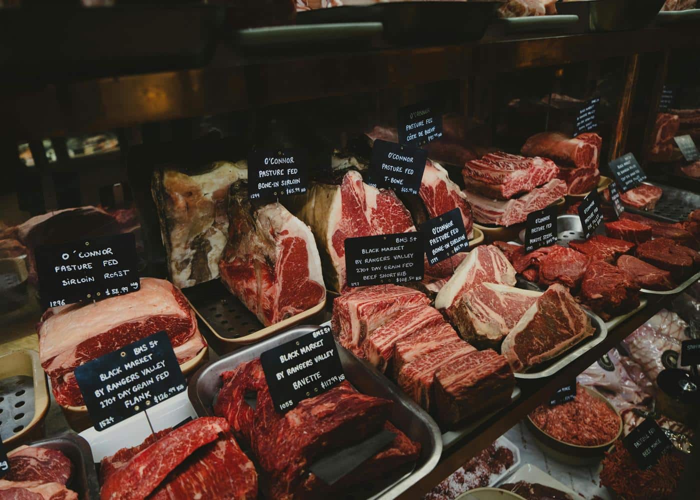 Raw meat displayed at a butcher's
